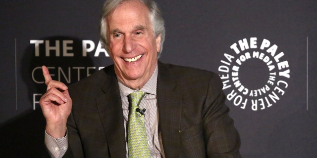 Henry Winkler referred to his 'Happy Days' co-star Scott Baio as 'family' despite their opposing political views.
