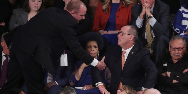Fred Guttenberg, father of Parkland school shooting victim Jaime Guttenberg, is ejected after shouting during President Trump's State of the Union address to a joint session of the U.S. Congress in the House Chamber of the U.S. Capitol in Washington, on Feb. 4, 2020. REUTERS/Tom Brenner