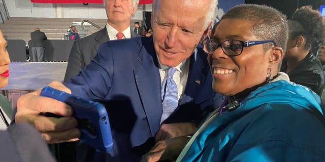 Former Vice President Joe Biden takes a selfie with a supporter at his South Carolina victory celebration, on Feb. 29, 2020 in Columbia, S.C. (Fox News)