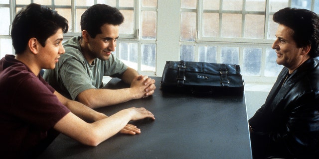 Ralph Macchio sits with Mitchell Whitfield and Joe Pesci in a scene from the film 'My Cousin Vinny', which is available on Hulu in July.