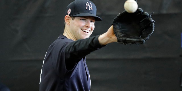 New York Yankees' Jordan Montgomery smiles during a spring training baseball workout Thursday, Feb. 13, 2020, in Tampa, Fla. (AP Photo/Frank Franklin II)