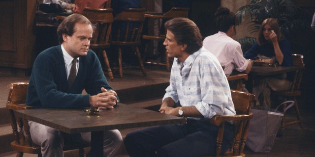 Kelsey Grammer as Dr. Frasier Crane and Ted Danson as Sam Malone in "Cheers." (Photo by: NBCU Photo Bank via Getty)