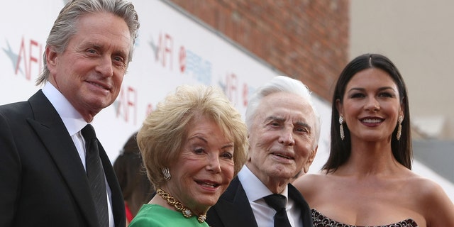 Actors Michael Douglas, Anne Buydens, Kirk Douglas and Catherine Zeta-Jones arrive at AFI Lifetime Achievement Award: A Tribute to Michael Douglas held at Sony Pictures Studios on June 11, 2009.