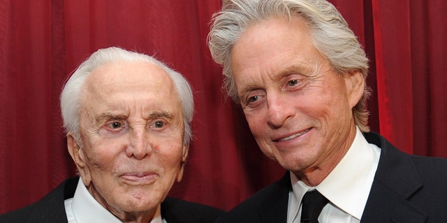 Kirk Douglas (L) and Michael Douglas in 2011.