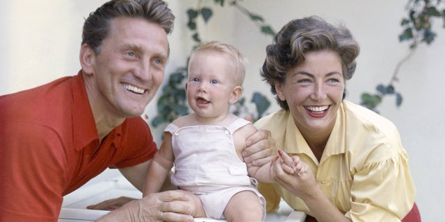 Kirk Douglas, Anne Buydens and their son Eric. (Photo by Sunset Boulevard/Corbis via Getty Images)