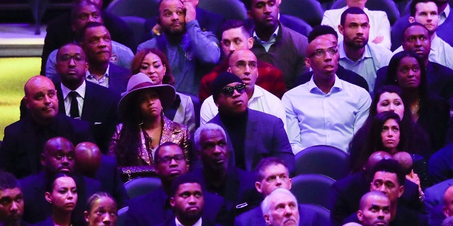 LL Cool J, middle, watches during a celebration of life for Kobe Bryant and his daughter Gianna Monday, Feb. 24, 2020, in Los Angeles. (AP Photo/Marcio Jose Sanchez)