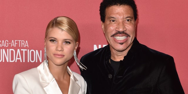 Lionel Richie and daughter Sofia Richie arrive at SAG-AFTRA Foundation Patron of the Artists Awards 2017 on November 9, 2017 in Beverly Hills, California.