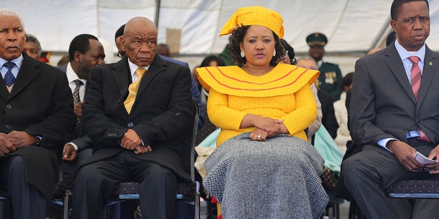 Newly appointed Lesotho prime Minister Thomas Thabane (L), leader of the All Basotho Convention (ABC) political party, his wife 'Ma Isaiah Ramoholi Thabane. (SAMSON MOTIKOE/AFP via Getty Images)