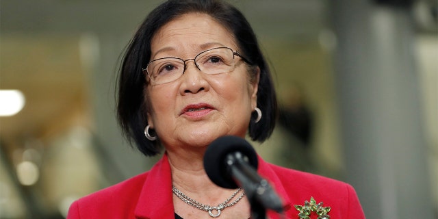 Sen. Mazie Hirono, D-Hawaii, speaks to reporters on Capitol Hill in Washington, Thursday, Jan. 30, 2020, during the impeachment trial of President Donald Trump on charges of abuse of power and obstruction of Congress. Hirono has changed her opinion on the legislative filibuster since signing a 2017 letter supporting it. (AP Photo/Julio Cortez)