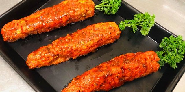 Samways' meat-based "carrots" are made from seasoned minced pork, an orange-hued Italian seasoning glaze and parsley.