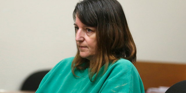 FILE- In this June 2, 2015 file photo, Michelle Lodzinski appears in court for a status conference in New Brunswick, N.J. New Jersey's Supreme Court said Friday, Feb. 21, 2020 that it would hear Lodzinski's appeal for the 1991 murder of her five-year-old son, Timothy Wiltsey. Lodzinski was living in Florida when she was arrested in 2014 and charged with the boy's murder. (Patti Sapone/The Star-Ledger via AP, Pool, File)