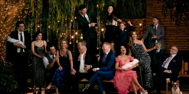 The 'Modern Family' cast poses for a group shot as the show is set to end in April after 11 seasons.