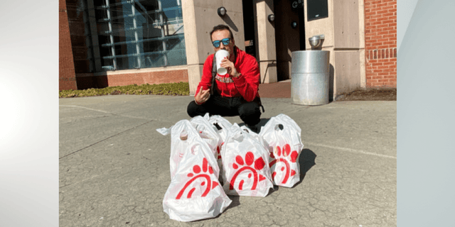 Team captain Putrino, seen here making his team's Chick-fil-A dreams a reality.