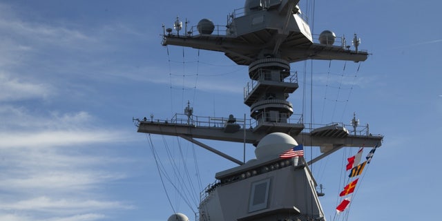 USS Gerald R. Ford (CVN 78) raises the American flag on its mast as the ship get underway, Feb. 3, 2020 - file photo.