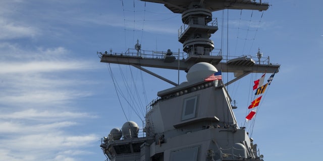 USS Gerald R. Ford (CVN 78) raises the American flag on its mast as the ship get underway, Feb. 3, 2020