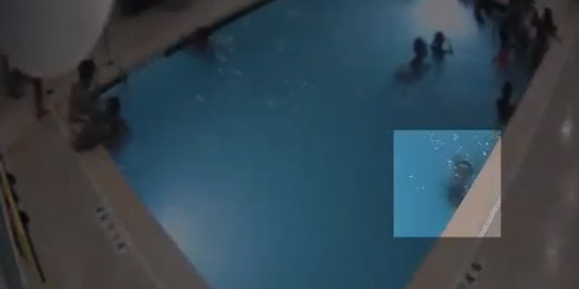 The disturbing footage released by police shows the 2-year-old boy's near-drowning in a hotel pool last month.