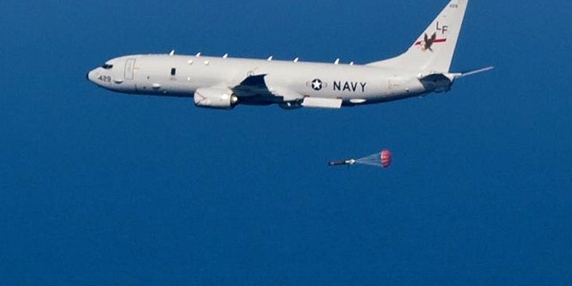 A U.S. Navy P-8A Poseidon is seen dropping an anti-submarine torpedo. In the flight on Monday, Taiwan's defense ministry said the plane traveled in a path it described "as normal," according to Reuters.