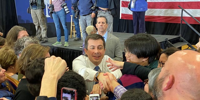 Democratic presidential candidate Pete Buttigieg shakes hands with supporters at a town hall in Columbia, S.C. on the eve of the South Carolina primary, on Feb. 22, 2020. (Fox News)