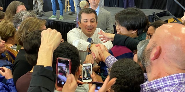 Democratic presidential candidate Pete Buttigieg shakes hands with supporters at a town hall in Columbia, S.C. on the eve of the South Carolina primary, on Feb. 22, 2020. (Fox News)