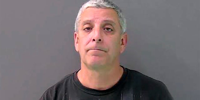 This Monday, Feb. 10, 2020, booking photo provided by the Bell County Jail shows Temple Police officer Carmen DeCruz.? (Bell County Jail via AP)