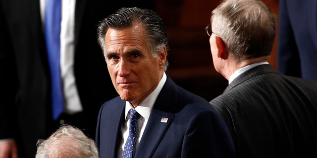 Sen. Mitt Romney, R-Utah, arrives before President Donald Trump delivers his State of the Union address to a joint session of Congress on Capitol Hill in Washington, Tuesday, Feb. 4, 2020. (AP Photo/Patrick Semansky)
