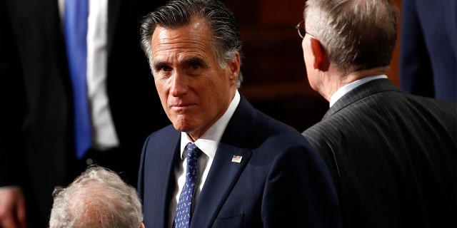 Sen. Mitt Romney, R-Utah, arrives before President Donald Trump delivers his State of the Union address to a joint session of Congress on Capitol Hill in Washington, Tuesday, Feb. 4, 2020. (AP Photo/Patrick Semansky)