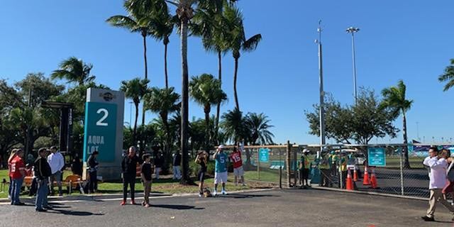 Fans gathered outside the Hard Rock Stadium in Miami Gardens to take photos ahead of kickoff.