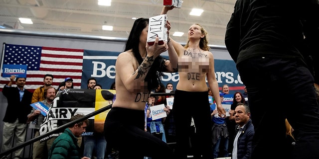 At least two topless women took the stage at Sanders' Nevada campaign event.
