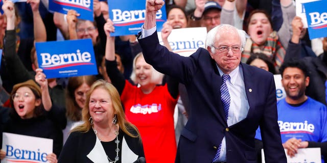 Democratic presidential candidate Sen. Bernie Sanders, I-Vt., with his wife Jane O'Meara Sanders, arrives to speak to supporters at a primary night election rally in Manchester, N.H., Tuesday, Feb. 11, 2020. (AP Photo/Pablo Martinez Monsivais)