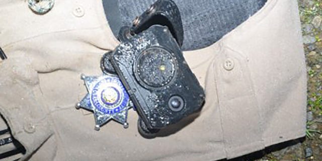A body camera worn by Gill was partially to thank for protecting him from a bullet that struck him in the chest, officials said.