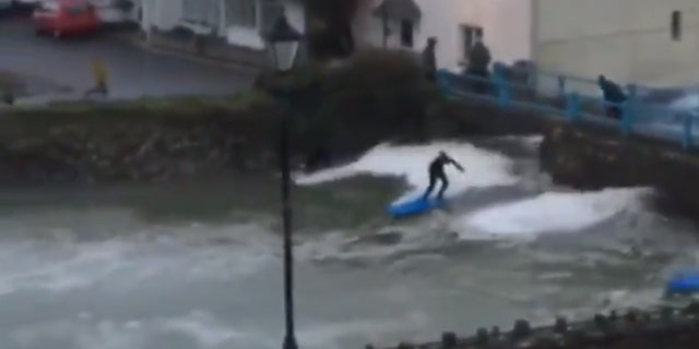 Surfers can be seen in Cornwall on Sunday.