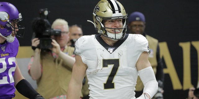 Jan 5, 2020; New Orleans, Louisiana, USA; New Orleans Saints quarterback Taysom Hill (7) reacts after catching a pass for a touchdown against the Minnesota Vikings during the fourth quarter of a NFC Wild Card playoff football game at the Mercedes-Benz Superdome.