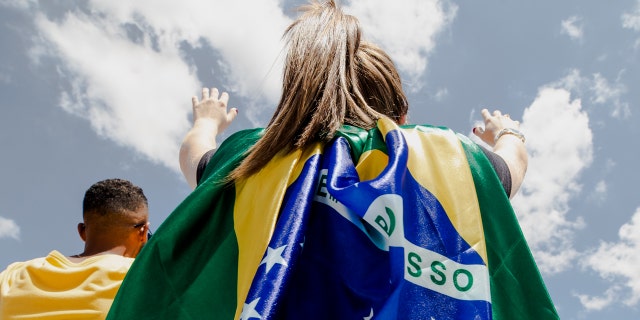 A young lady worships during The Send Brazil on Saturday, Feb. 8, 2020.