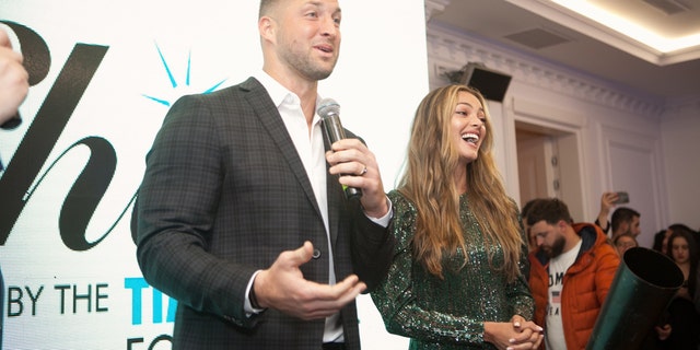 Tim Tebow and his wife, Demi-Leigh Nel-Peters, speak at the first "Night to Shine" event of 2020 in Albania. The big worldwide celebration is on Friday night, ahead of Valentine's Day.