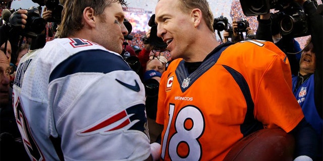 Tom Brady and Peyton Manning shake hands after a game.
