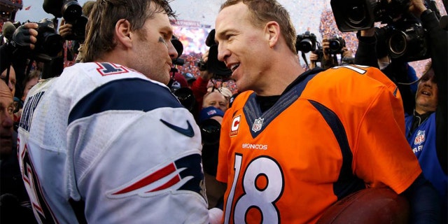 Tom Brady and Peyton Manning shake hands after a game.