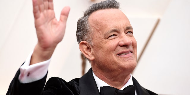 Tom Hanks explained why he loves crashing weddings on "Late Night With Seth Meyers."