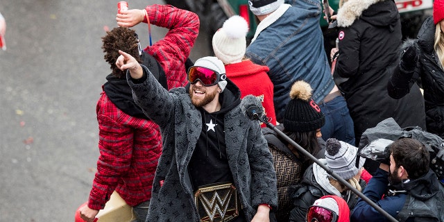 Travis Kelce of the Kansas City Chiefs points to the crowd during the Kansas City Super Bowl Parade Wednesday afternoon in Kansas City, Missouri. (Brian Davidson/Getty Images)