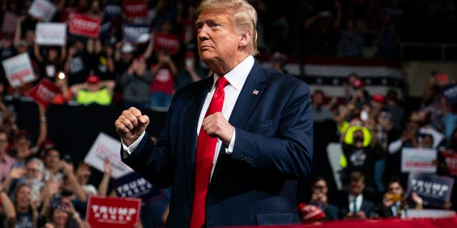 President Donald Trump arrives to speak at a campaign rally at Veterans Memorial Coliseum, Wednesday, Feb. 19, 2020, in Phoenix. (AP Photo/Evan Vucci)