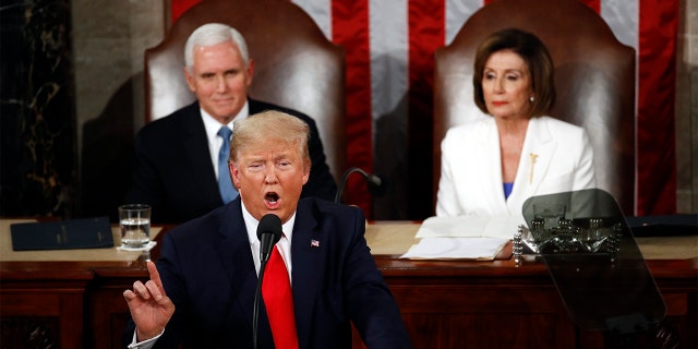 President Donald Trump delivers his State of the Union address to a joint session of Congress on Capitol Hill in Washington, Tuesday, Feb. 4, 2020, as Vice President Mike Pence and House Speaker Nancy Pelosi, D-Calif., watch.