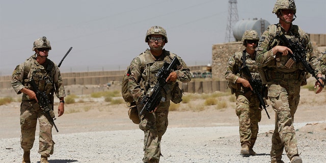 U.S. troops patrol at an Afghan National Army (ANA) Base in Logar province, Afghanistan August 7, 2018. REUTERS/Omar Sobhani - RC1D8EB3A110