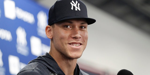 New York Yankees player Aaron Judge speaks to reporters after a spring training baseball workout, Feb. 18, 2020, in Tampa, Fla. (Associated Press)