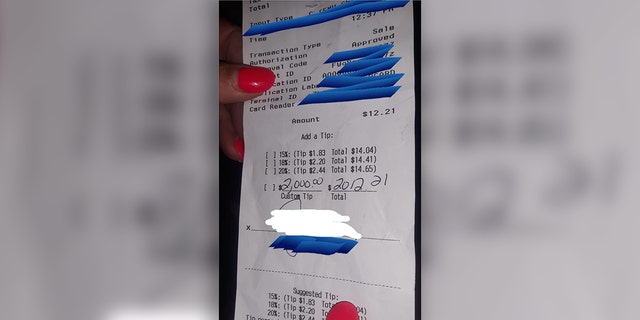 Massachusetts waitress was recently shocked to receive a $2,000 tip on a $12 lunch bill, pictured, from an incredibly generous customer.