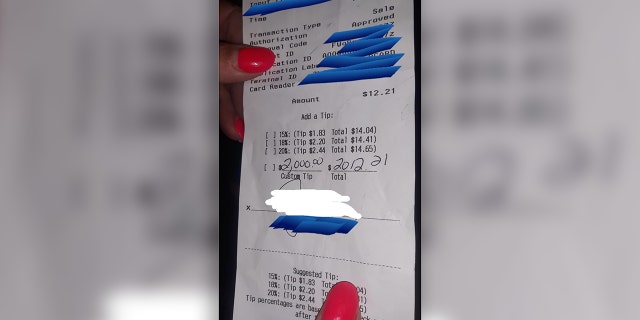 Massachusetts waitress was recently shocked to receive a $2,000 tip on a $12 lunch bill, pictured, from an incredibly generous customer.