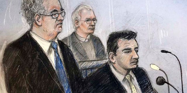 Julian Assange, center, is depicted in this court sketch alongside his lawyers, Edward Fitzgerald, on the left, and Mark Summers at Belmarsh Magistrates' Court in London on Monday. (AP)