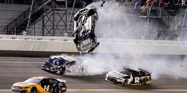 Ryan Newman, top center, went airborne in the final lap of the race. (AP Photo/Terry Renna)