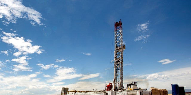An oil drilling rig is pictured.