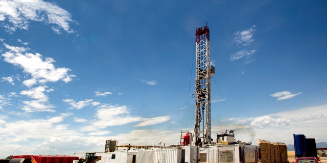 An oil drilling rig is pictured.