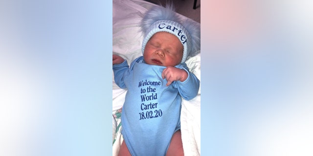 A young Scottish girl’s hilariously skeptical reaction to meeting her new baby brother, pictured, for the first time in the hospital has gone viral on social media.