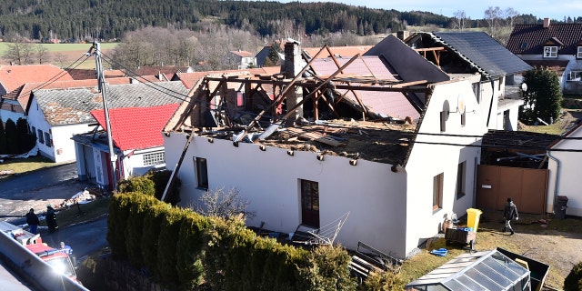 The roof of a house is damaged due to a strong storm in Rohozna, Czech Republic, Monday, Feb. 10, 2020.
